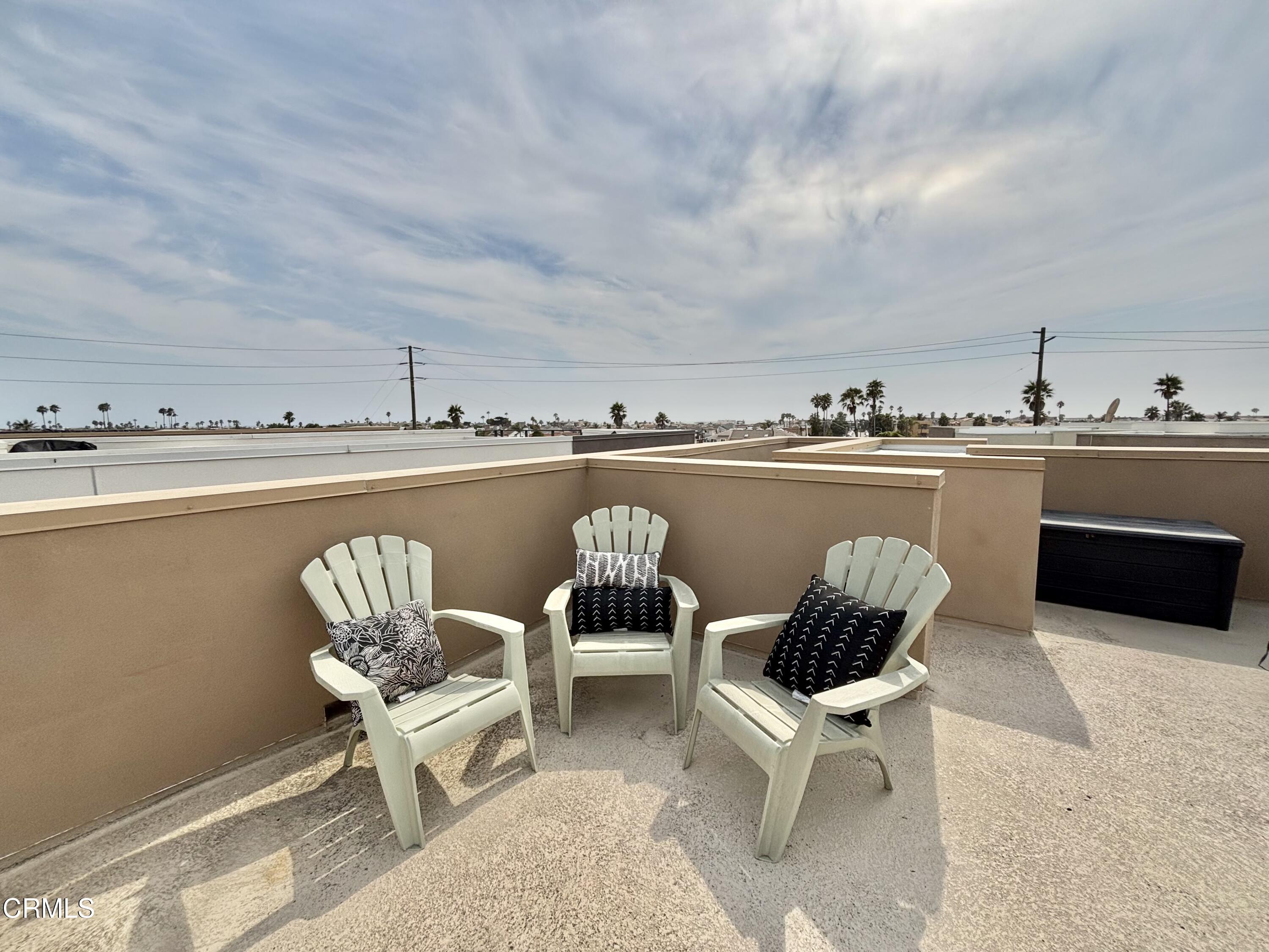 1105 Canal Street Oxnard, CA 93035 - Photo 14 of 14 a view of roof deck with chair and chairs