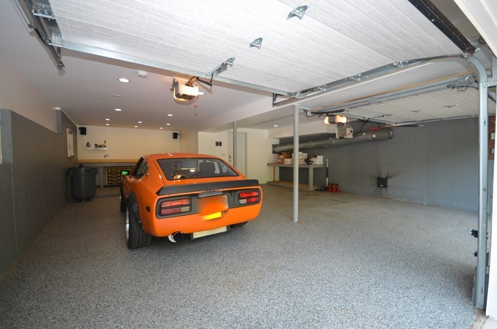 252 West Sutton Road Sutton, MA 01590 - Photo 31 of 35 a car parked in a garage