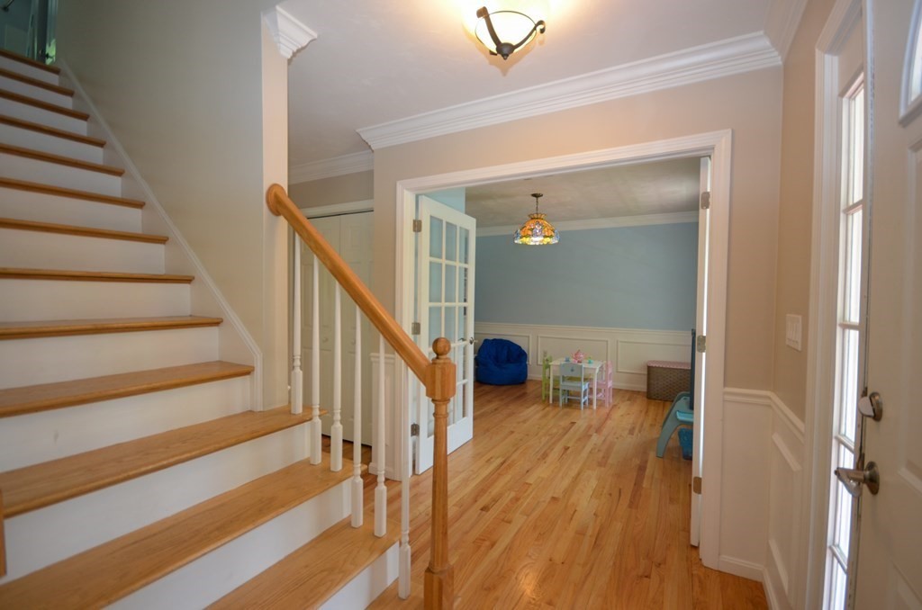252 West Sutton Road Sutton, MA 01590 - Photo 4 of 35 a view of entryway and hall with wooden floor