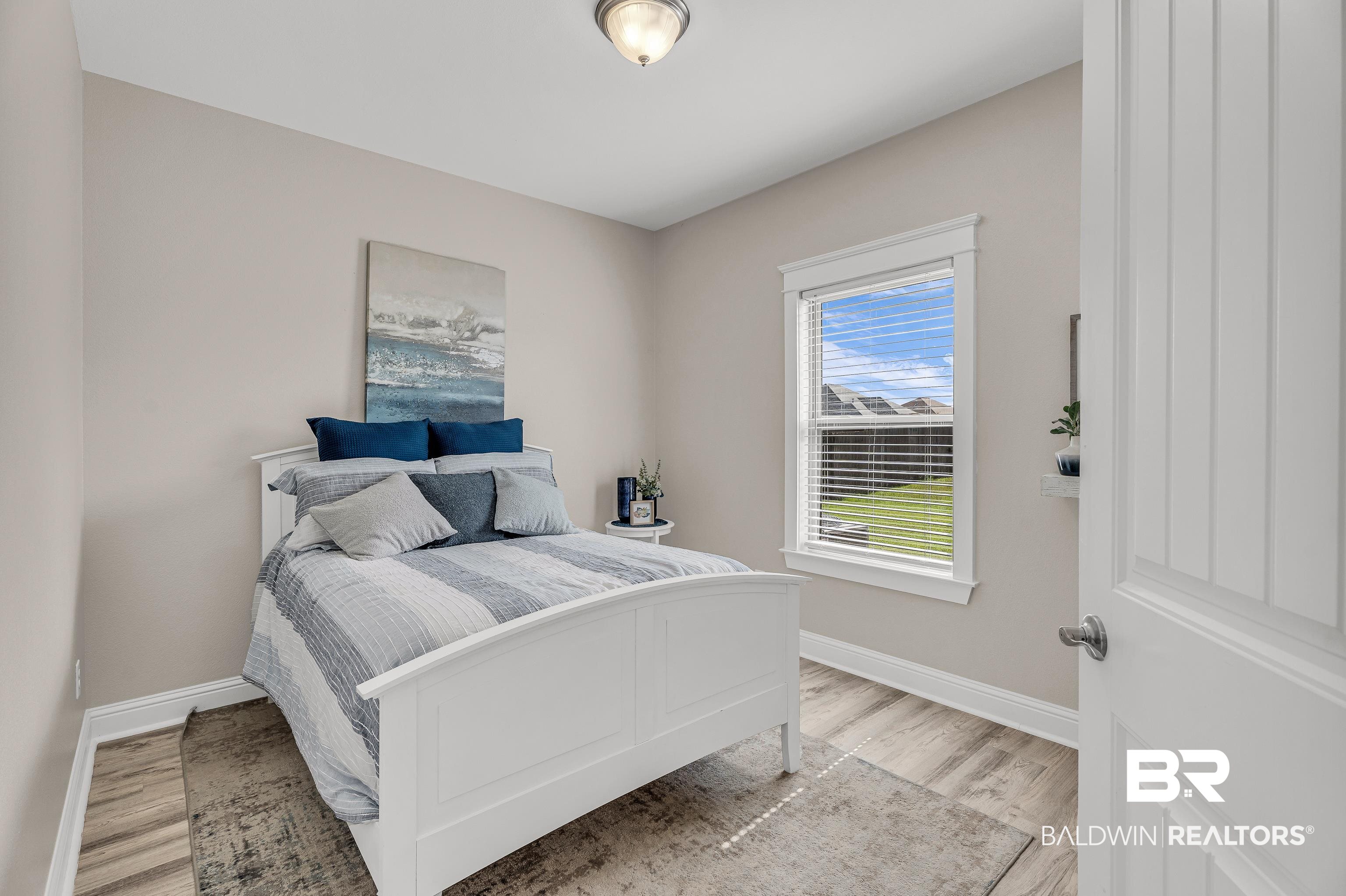 9675 Camberwell Drive Daphne, AL 36526 - Photo 6 of 34 Bedroom with light wood-style floors and baseboards