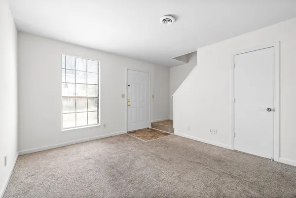 an empty room with windows