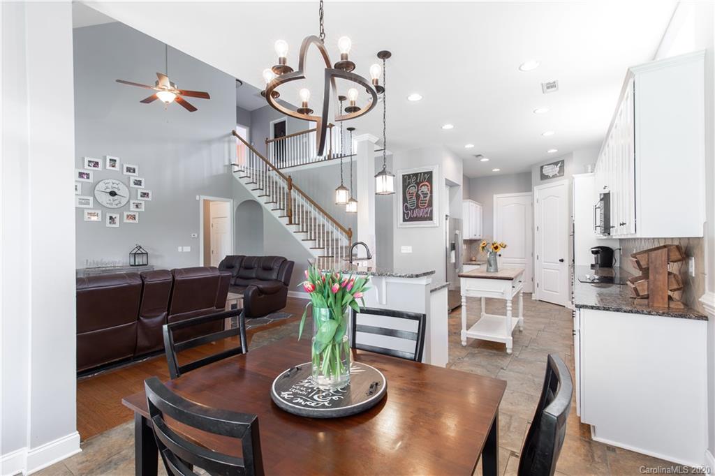 313 Miners Cove Way Fort Mill, SC 29708 - Photo 11 of 38 a view of a dining room with furniture