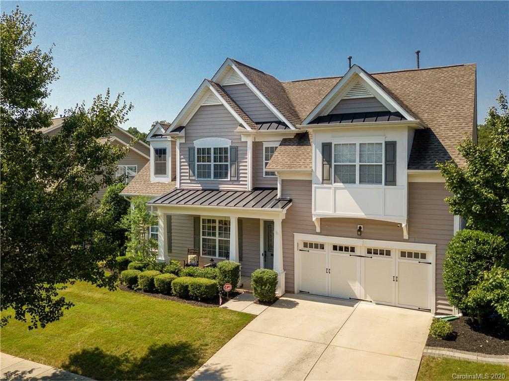 313 Miners Cove Way Fort Mill, SC 29708 - Photo 3 of 38 a front view of a house with a yard