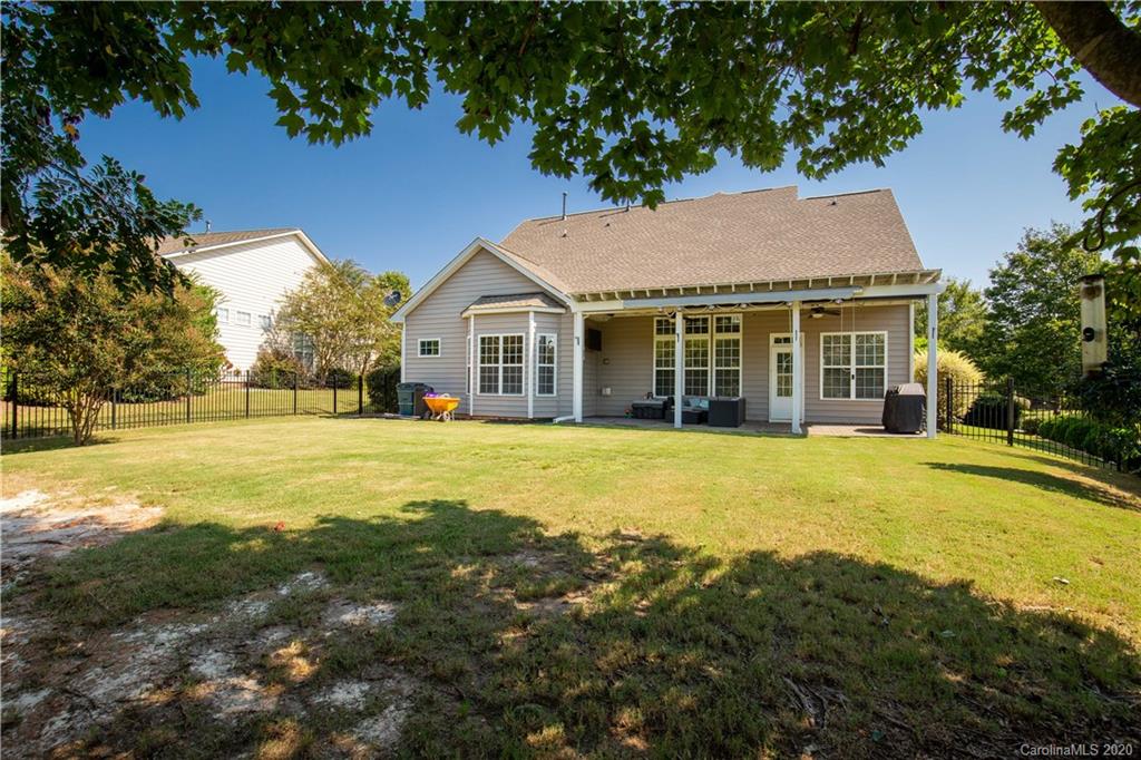 313 Miners Cove Way Fort Mill, SC 29708 - Photo 33 of 38 a front view of house with yard and green space