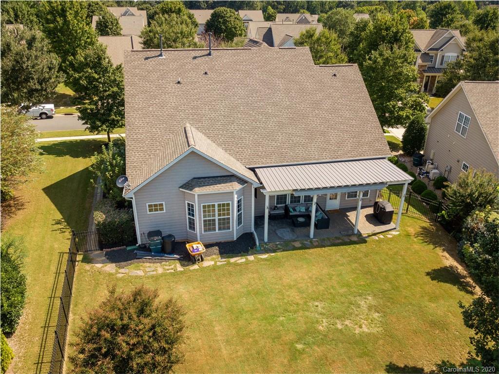 313 Miners Cove Way Fort Mill, SC 29708 - Photo 34 of 38 an aerial view of a house with swimming pool garden and patio