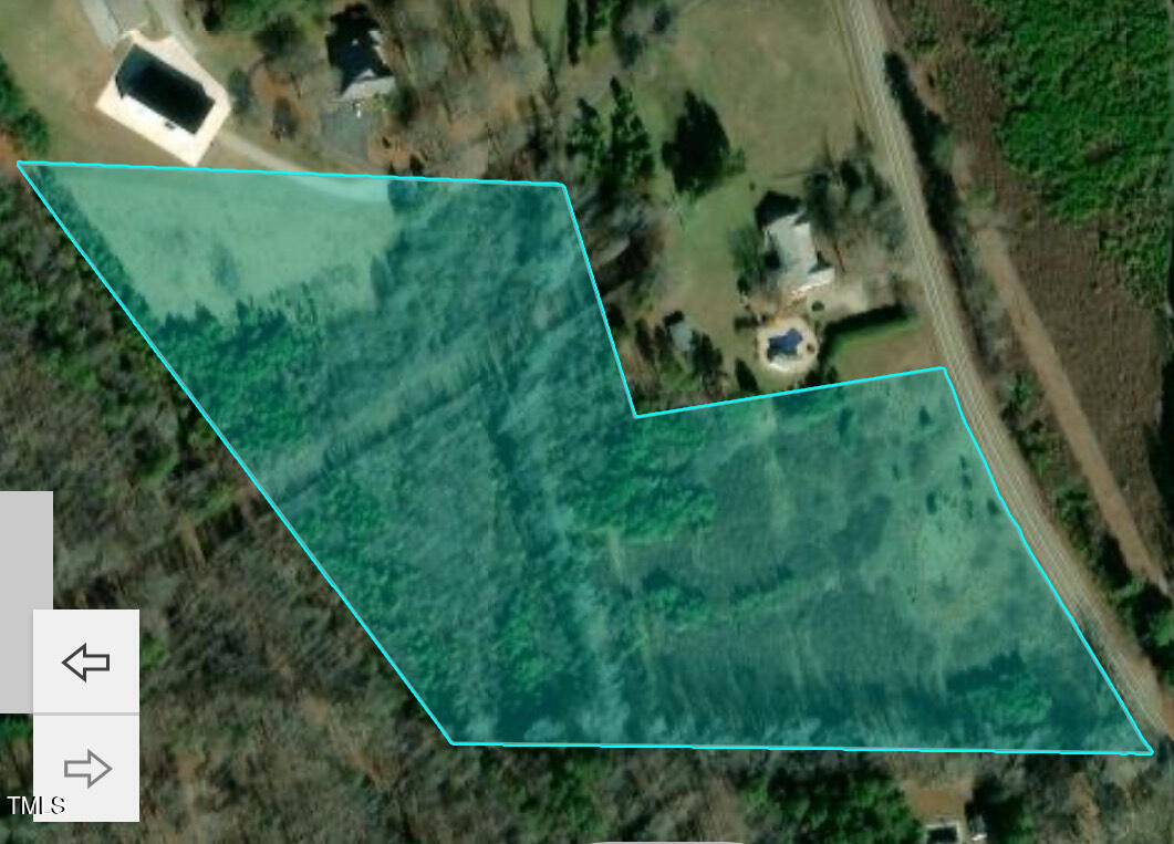 9841 Quail Roost Road Bahama, NC 27503 - Photo 3 of 12 a view of a backyard