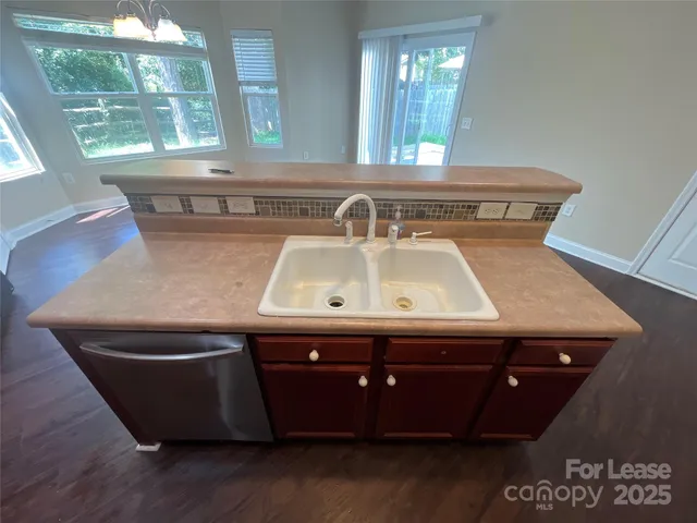 a close view of sink sitting inside of a room