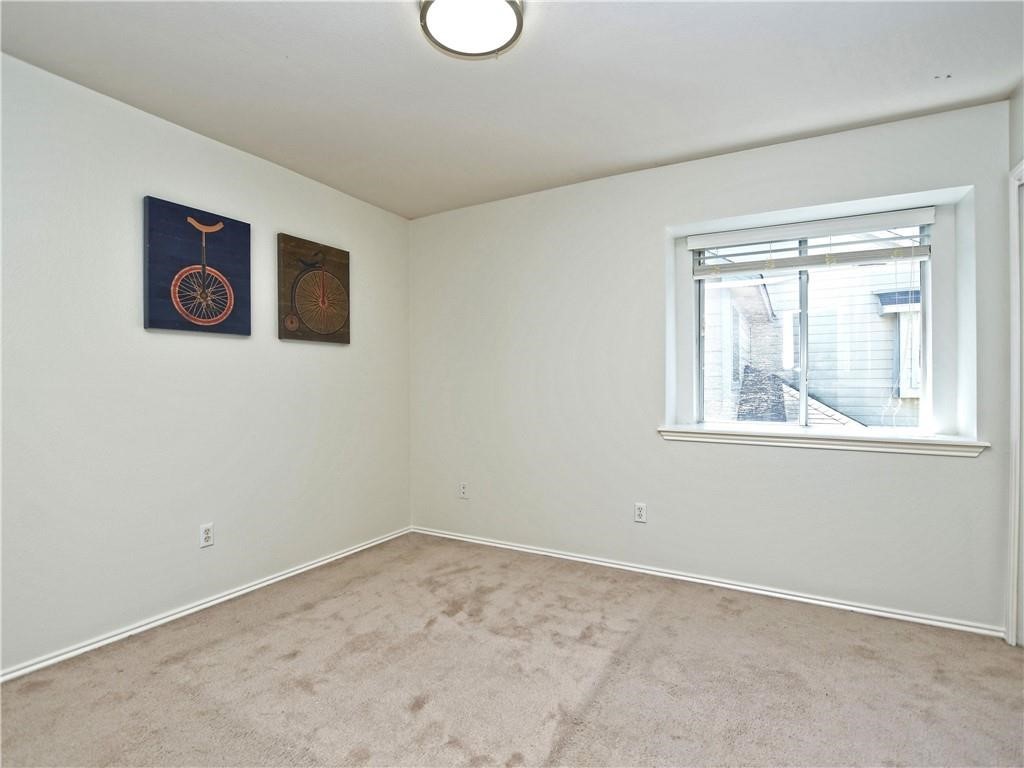 1117 Rawhide Trail Cedar Park, TX 78613 - Photo 22 of 36 a view of an empty room with a window