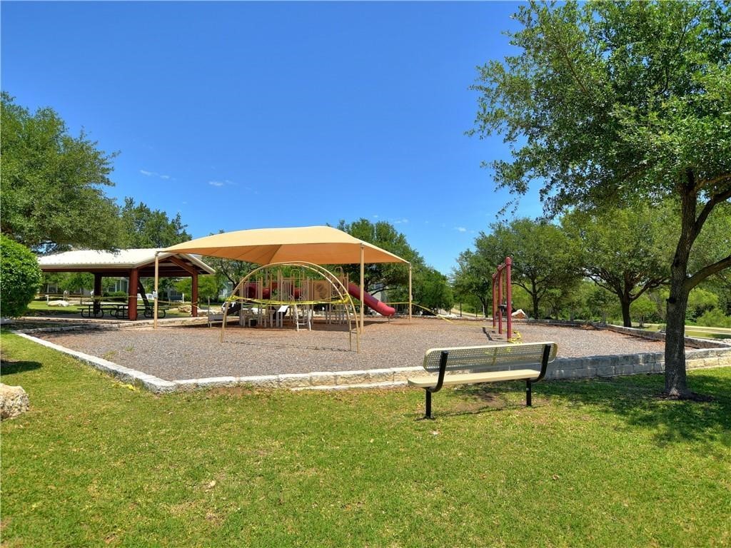 1117 Rawhide Trail Cedar Park, TX 78613 - Photo 35 of 36 a swimming pool with outdoor seating and yard