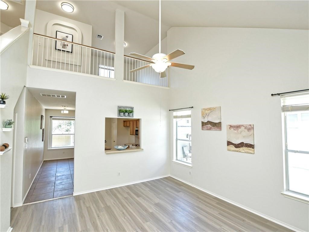 1117 Rawhide Trail Cedar Park, TX 78613 - Photo 5 of 36 a view of an entryway with wooden floor