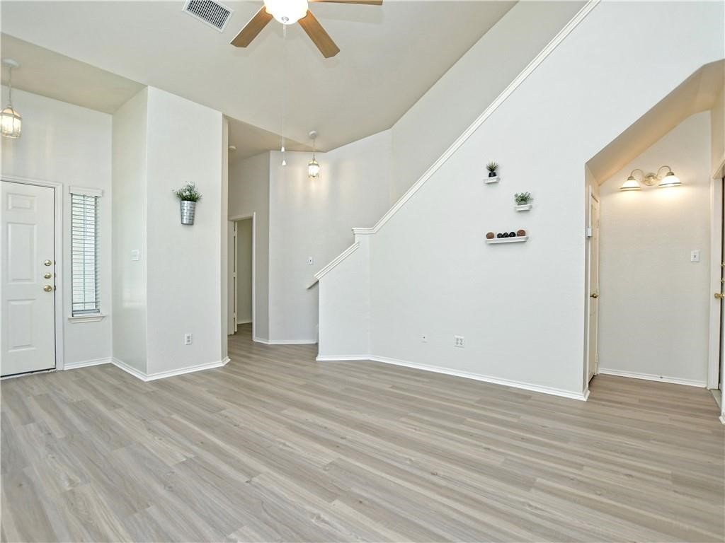 1117 Rawhide Trail Cedar Park, TX 78613 - Photo 7 of 36 wooden floor in an empty room