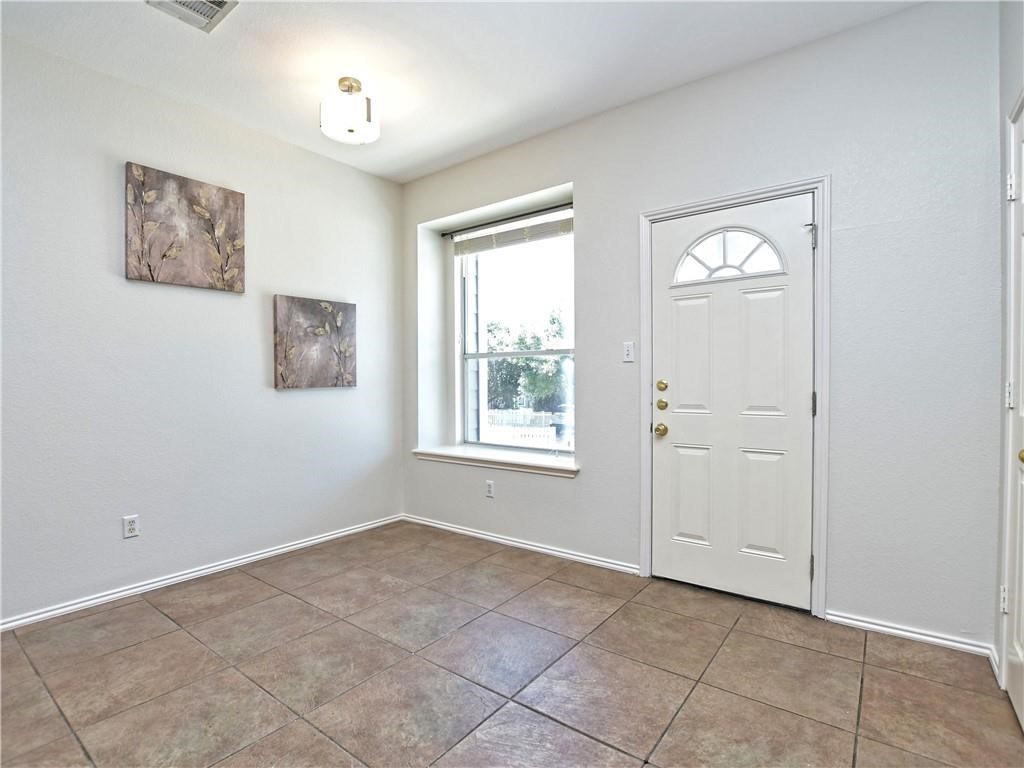 1117 Rawhide Trail Cedar Park, TX 78613 - Photo 10 of 36 a view of an empty room with window and closet area