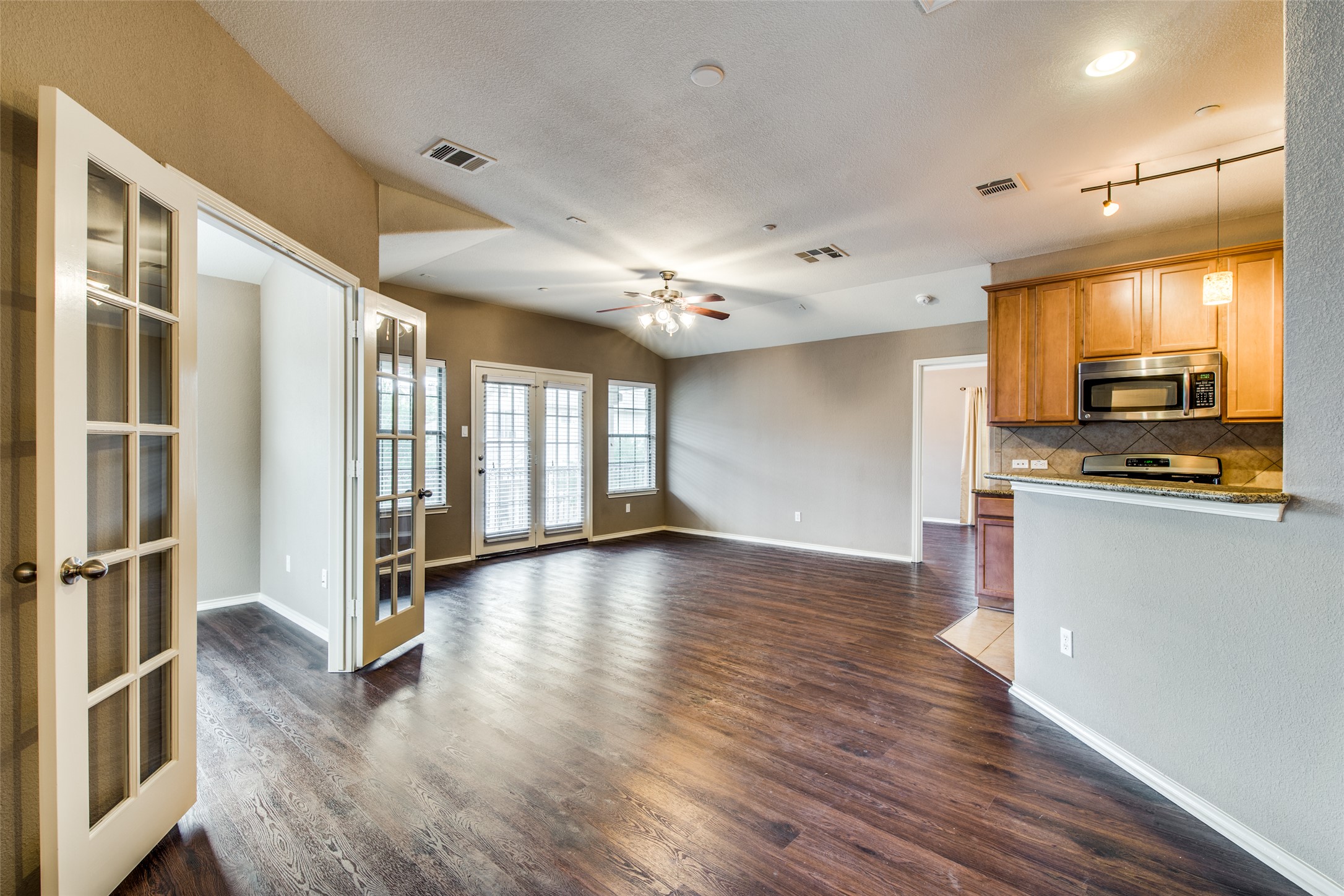 14815 Avery Ranch Boulevard, Unit 2301 Austin, TX 78717 - Photo 4 of 12 The open living/kitchen area is full of natural light.