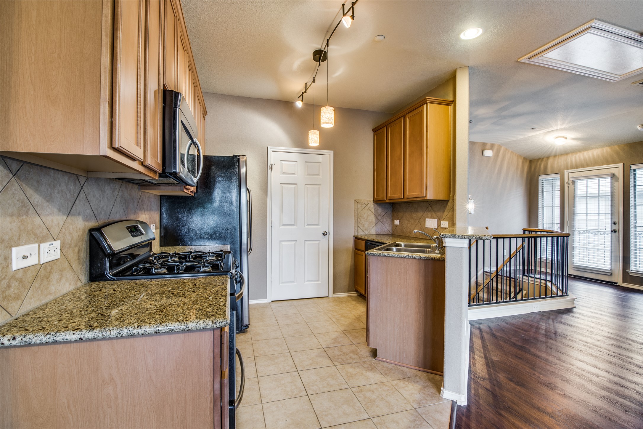 14815 Avery Ranch Boulevard, Unit 2301 Austin, TX 78717 - Photo 6 of 12 The kitchen has ample countertops for your cooking experiences.