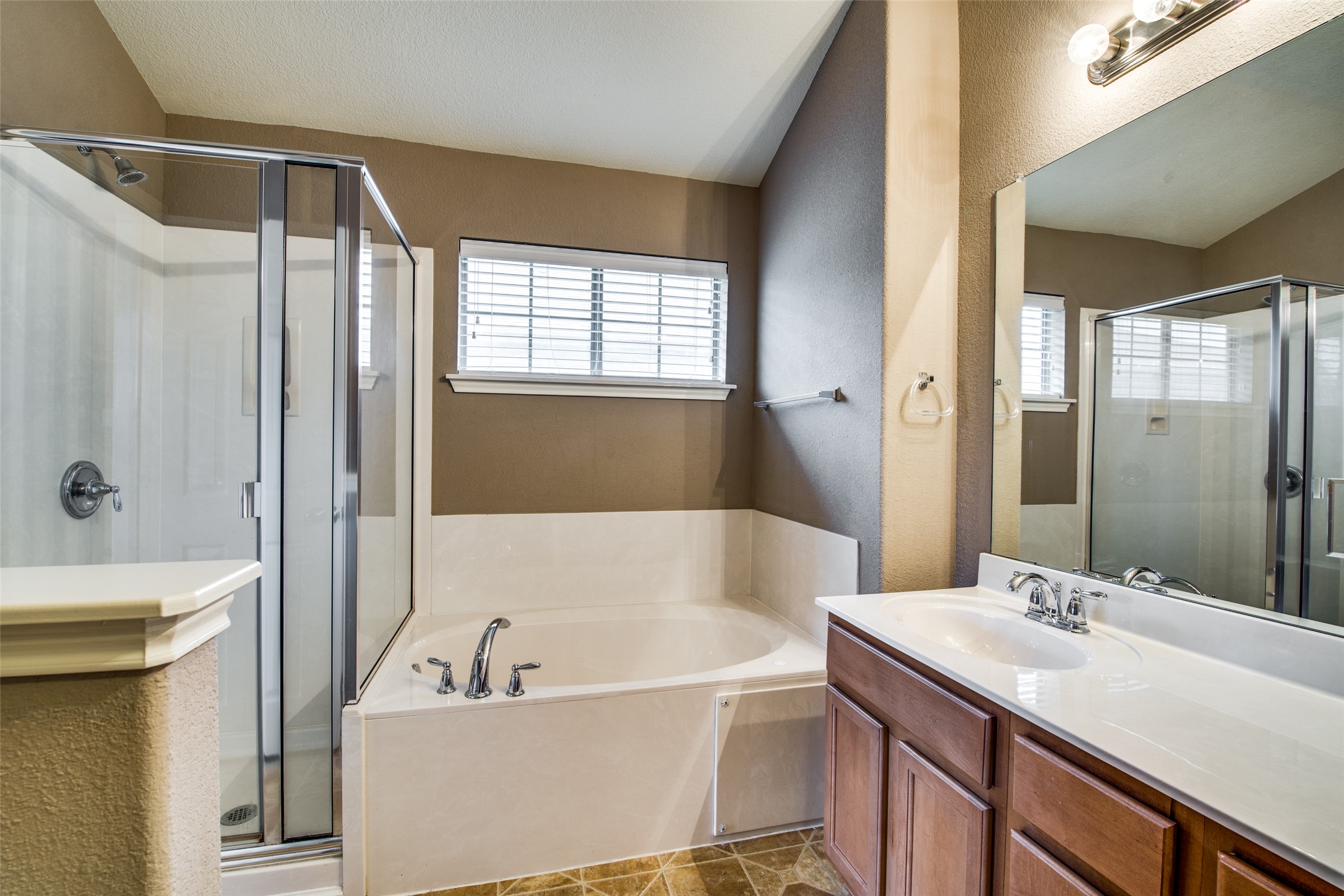 14815 Avery Ranch Boulevard, Unit 2301 Austin, TX 78717 - Photo 8 of 12 Main bathroom with walk-in shower and soaking tub.