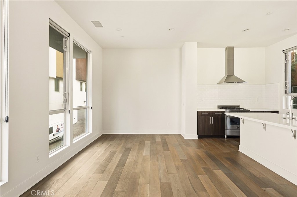 2201 Tom Mix Road Silver Lake, CA 90026 - Photo 11 of 25 a view of kitchen with wooden floor and electronic appliances