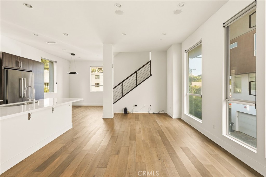2201 Tom Mix Road Silver Lake, CA 90026 - Photo 10 of 25 a view of empty room with wooden floor and fan