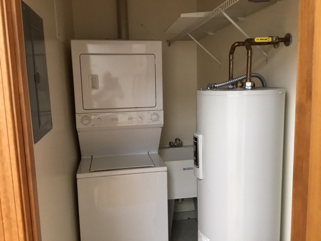 116 North Main Street, Unit 3 Wheaton, IL 60187 - Photo 7 of 12 a utility room with dryer and washer
