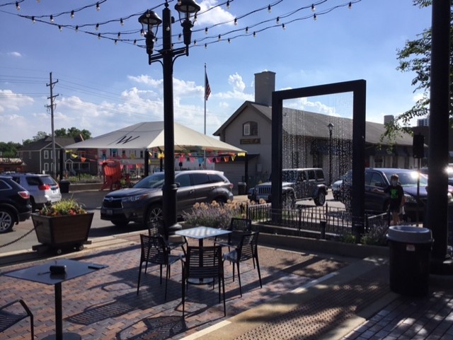 116 North Main Street, Unit 3 Wheaton, IL 60187 - Photo 9 of 12 a view of swimming pool with outdoor seating