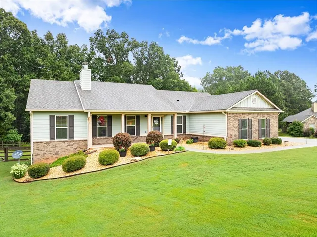 front view of a house with a yard