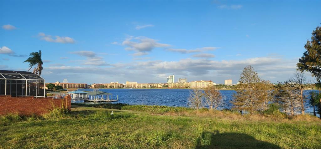 a view of residential houses with yard