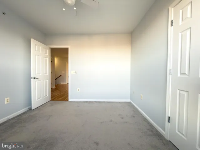 an empty room with a bathroom