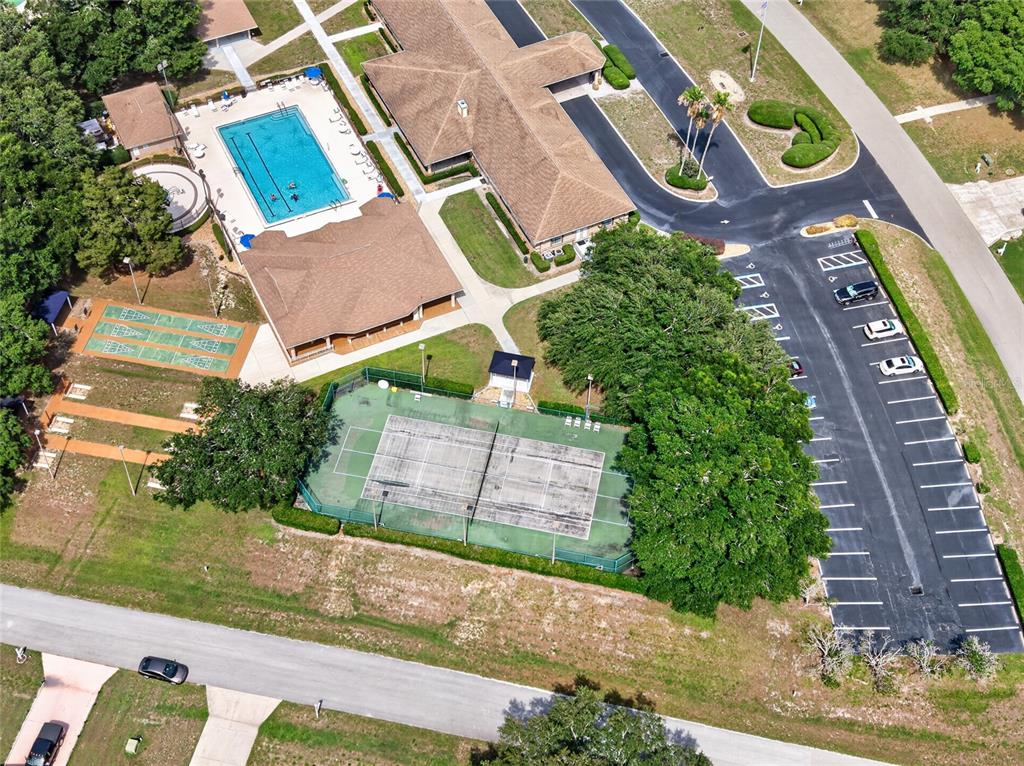 6032 Southwest 103rd Loop Ocala, FL 34476 - Photo 28 of 28 an aerial view of a house with a yard and garden space