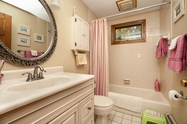 40 Allen Place, Unit 40 Scituate, MA 02066 - Photo 13 of 23 a bathroom with a sink a toilet and a bathtub