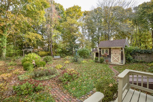 40 Allen Place, Unit 40 Scituate, MA 02066 - Photo 15 of 23 a front view of a house with a yard