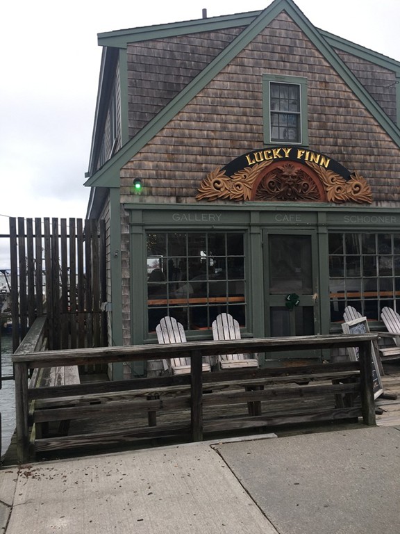 40 Allen Place, Unit 40 Scituate, MA 02066 - Photo 21 of 23 a front view of a house with entryway and windows