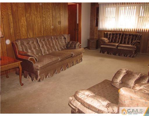 17 Gurley Road Edison, NJ 08817 - Photo 4 of 8 a view of a bedroom with furniture and windows