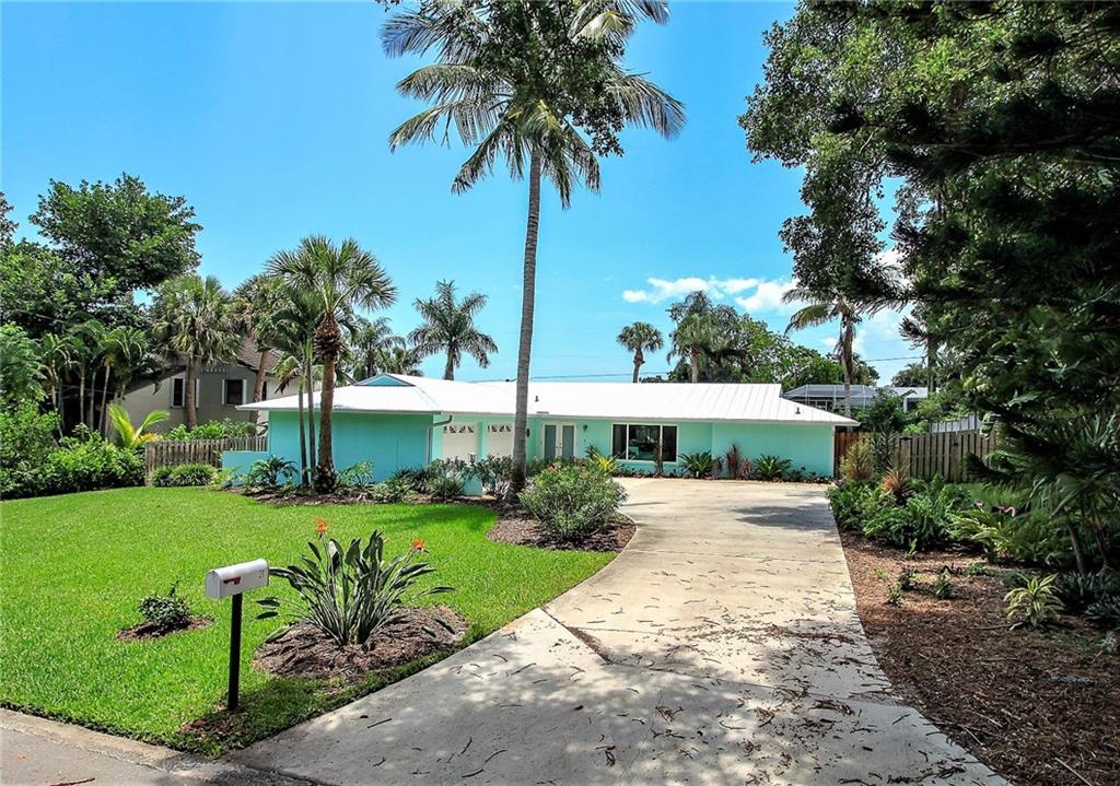 21 Ridgeview Road South Stuart, FL 34996 - Photo 22 of 22 a view of a garden with a house