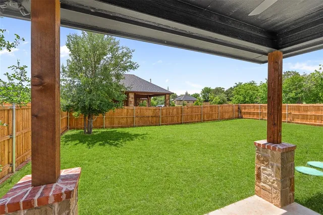 a view of a backyard with a garden