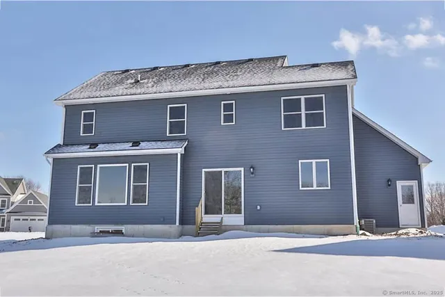 a front view of a house with yard