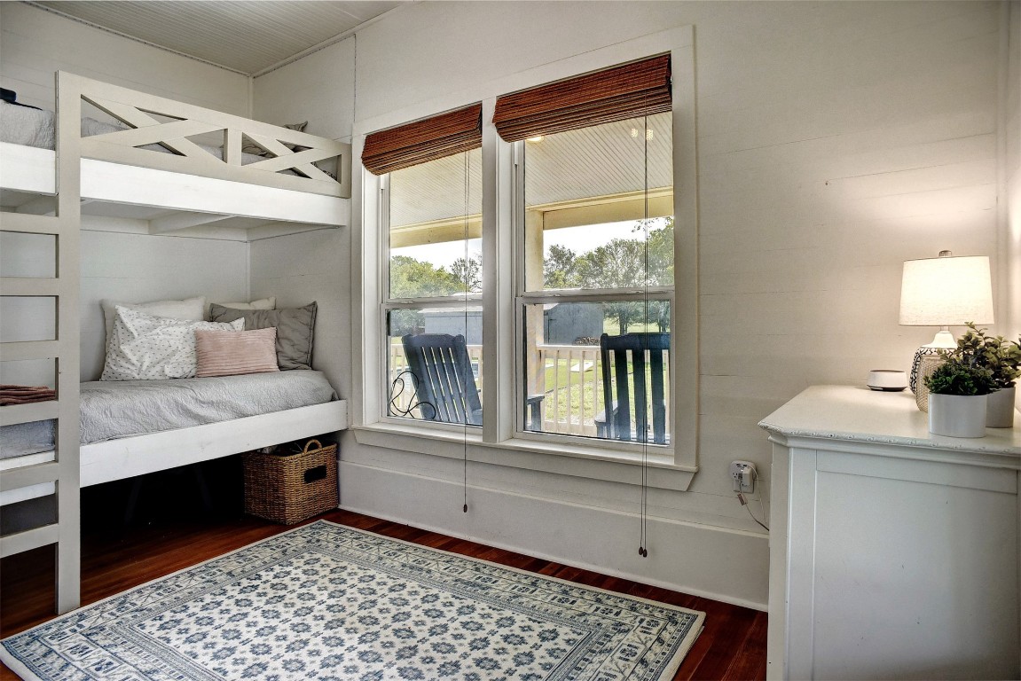 141 Grassyville Road Paige, TX 78659 - Photo 12 of 30 a bathroom with a sink and a mirror