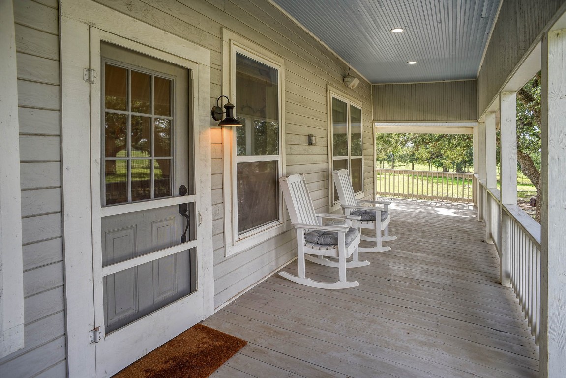 141 Grassyville Road Paige, TX 78659 - Photo 19 of 30 a outdoor space with wooden floor and furniture