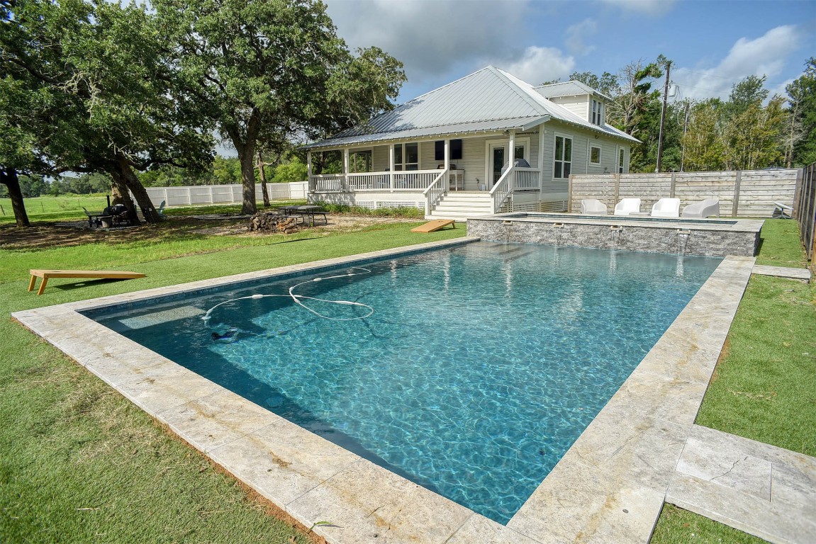 141 Grassyville Road Paige, TX 78659 - Photo 2 of 30 a view of a house with a yard