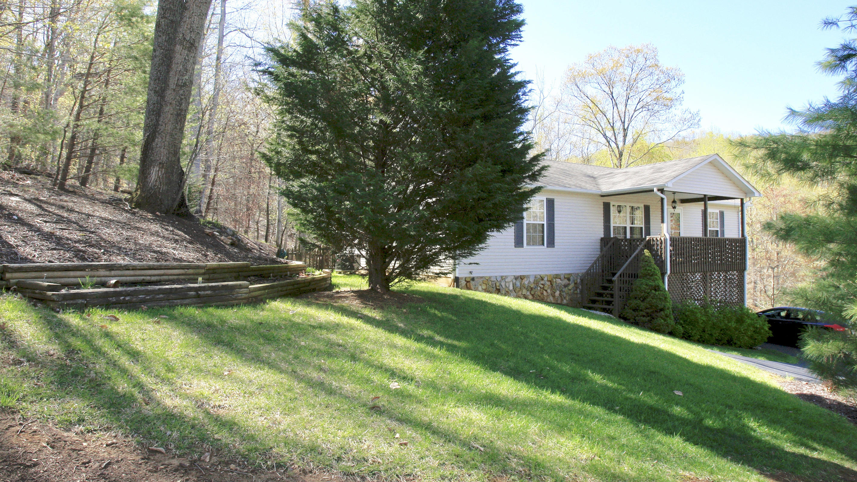 248 Silver Shadow Road Hardy, VA 24101 - Photo 50 of 50 a view of a house with pool and a yard