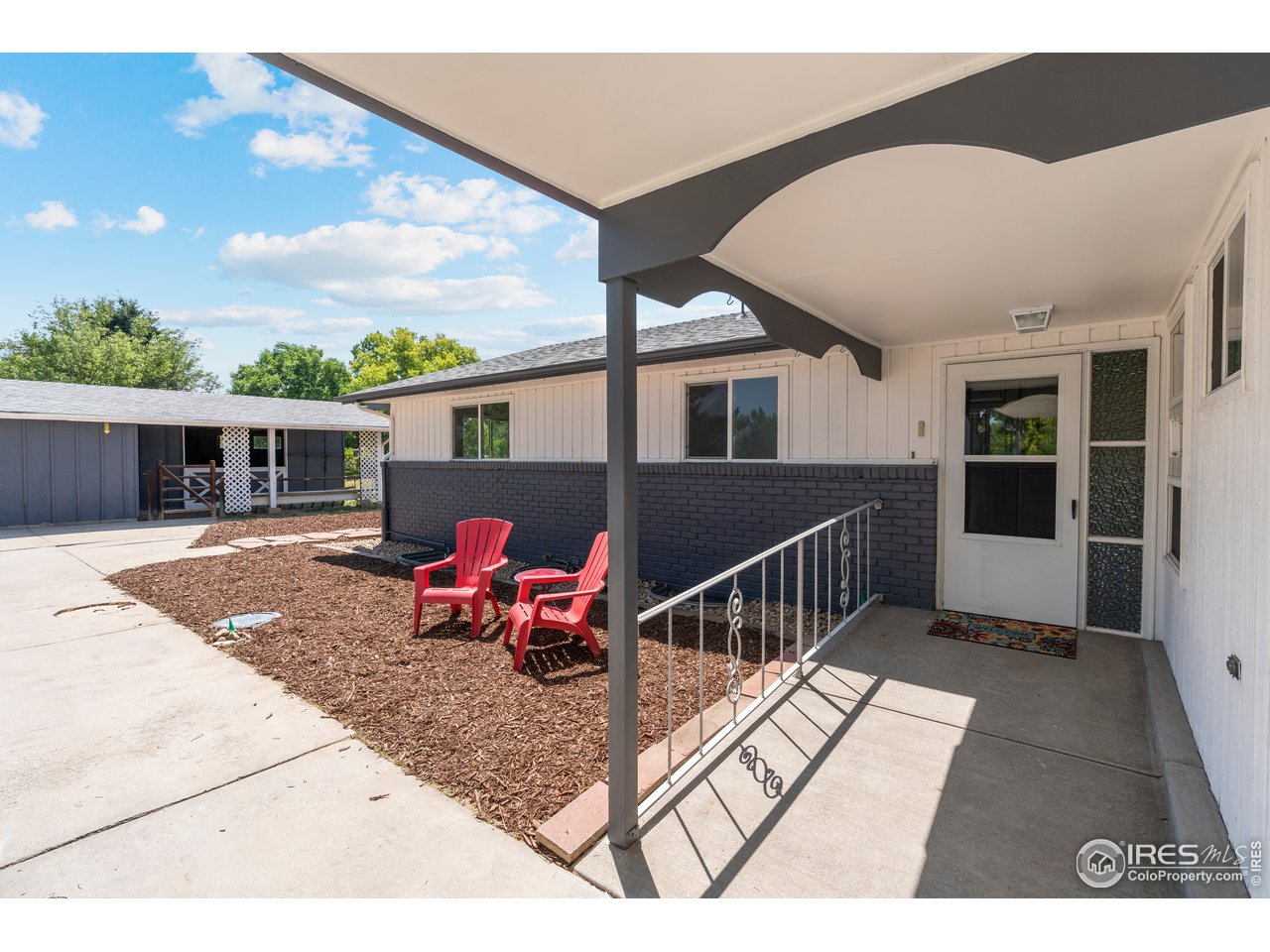 5758 Rustic Knolls Drive Boulder, CO 80301 - Photo 1 of 28 a view of a house with backyard and sitting area