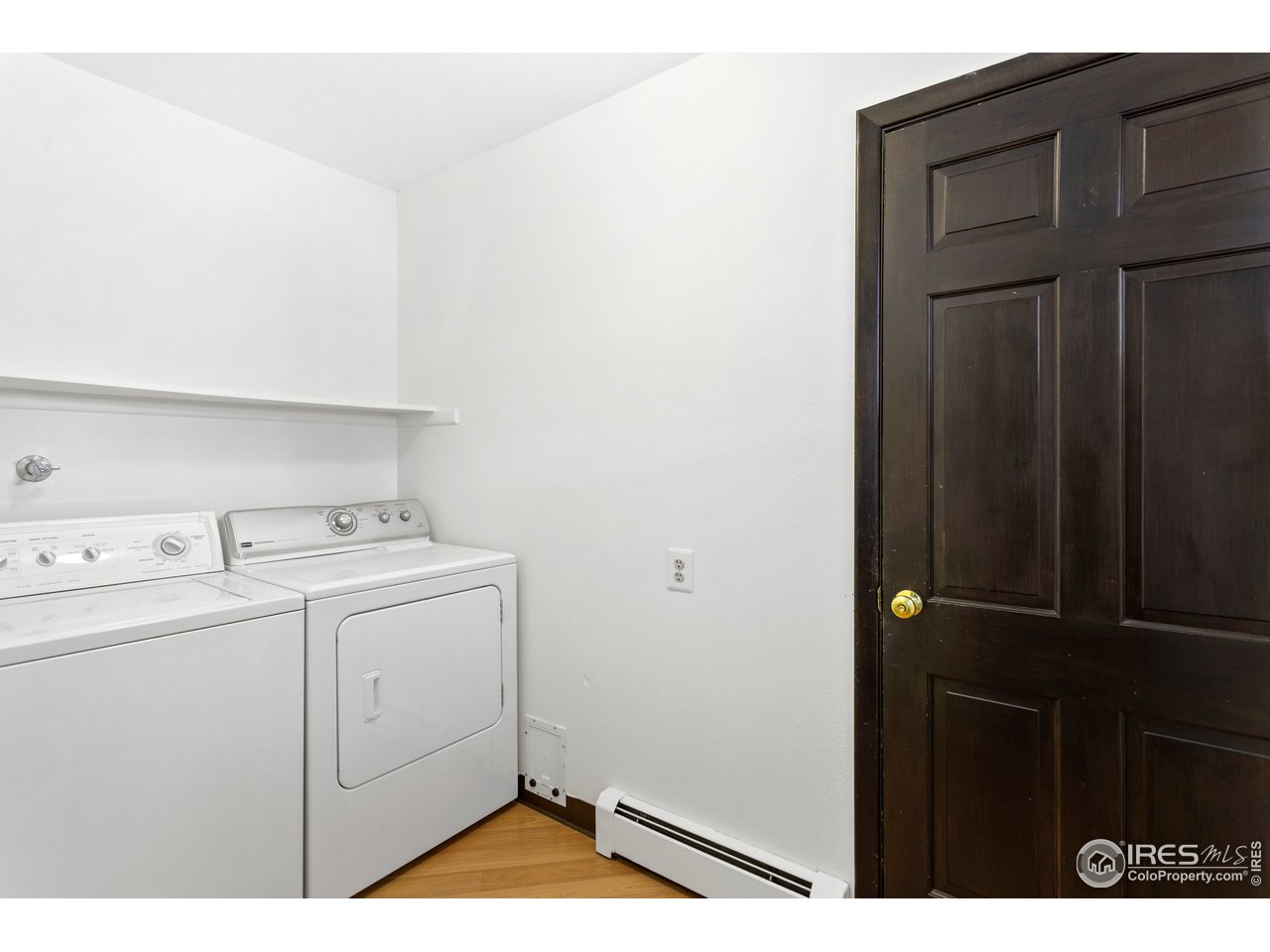 5758 Rustic Knolls Drive Boulder, CO 80301 - Photo 13 of 28 a view of storage and utility room with washer and dryer