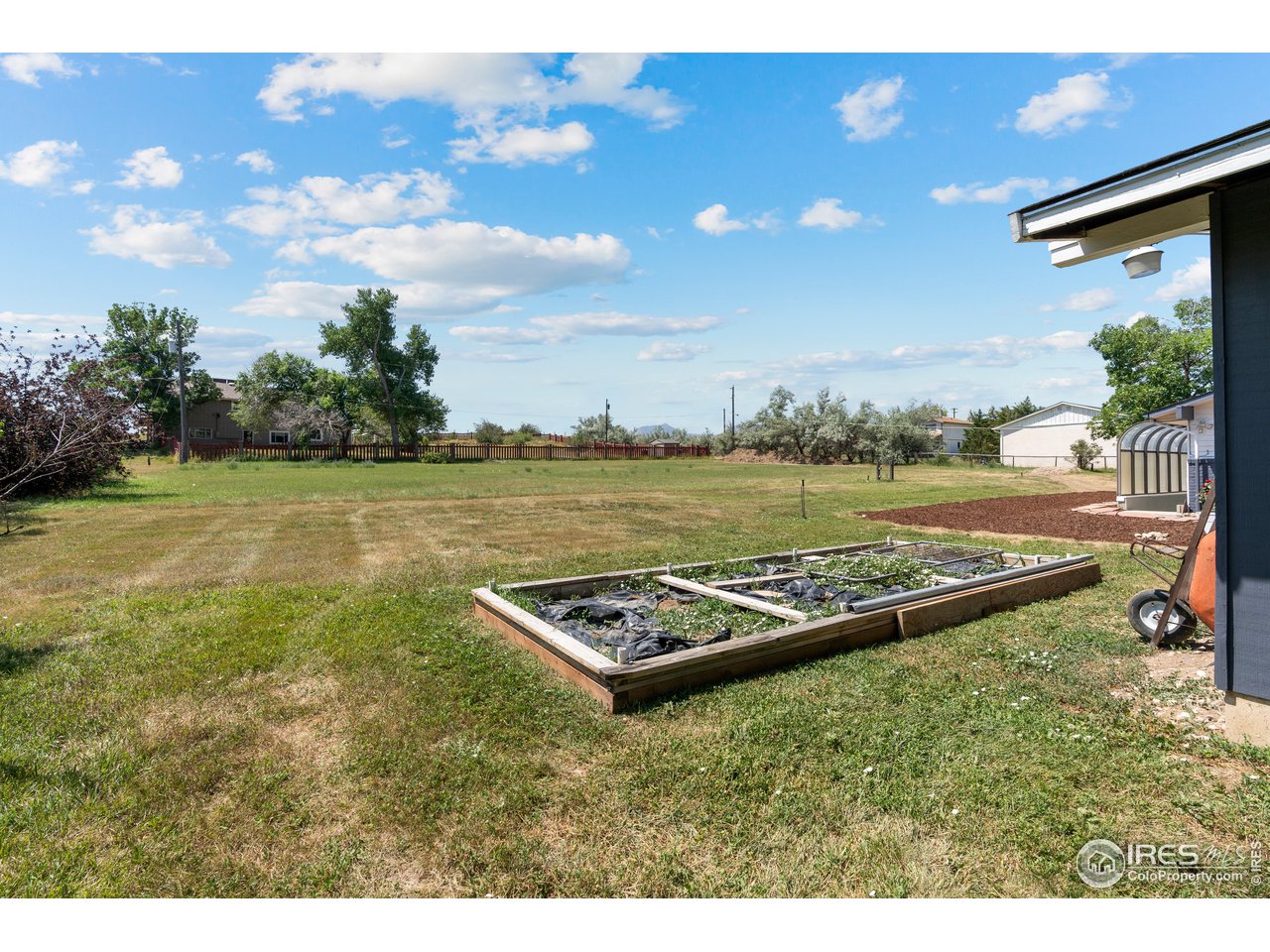 5758 Rustic Knolls Drive Boulder, CO 80301 - Photo 25 of 28 a view of a backyard with lake view and mountain view