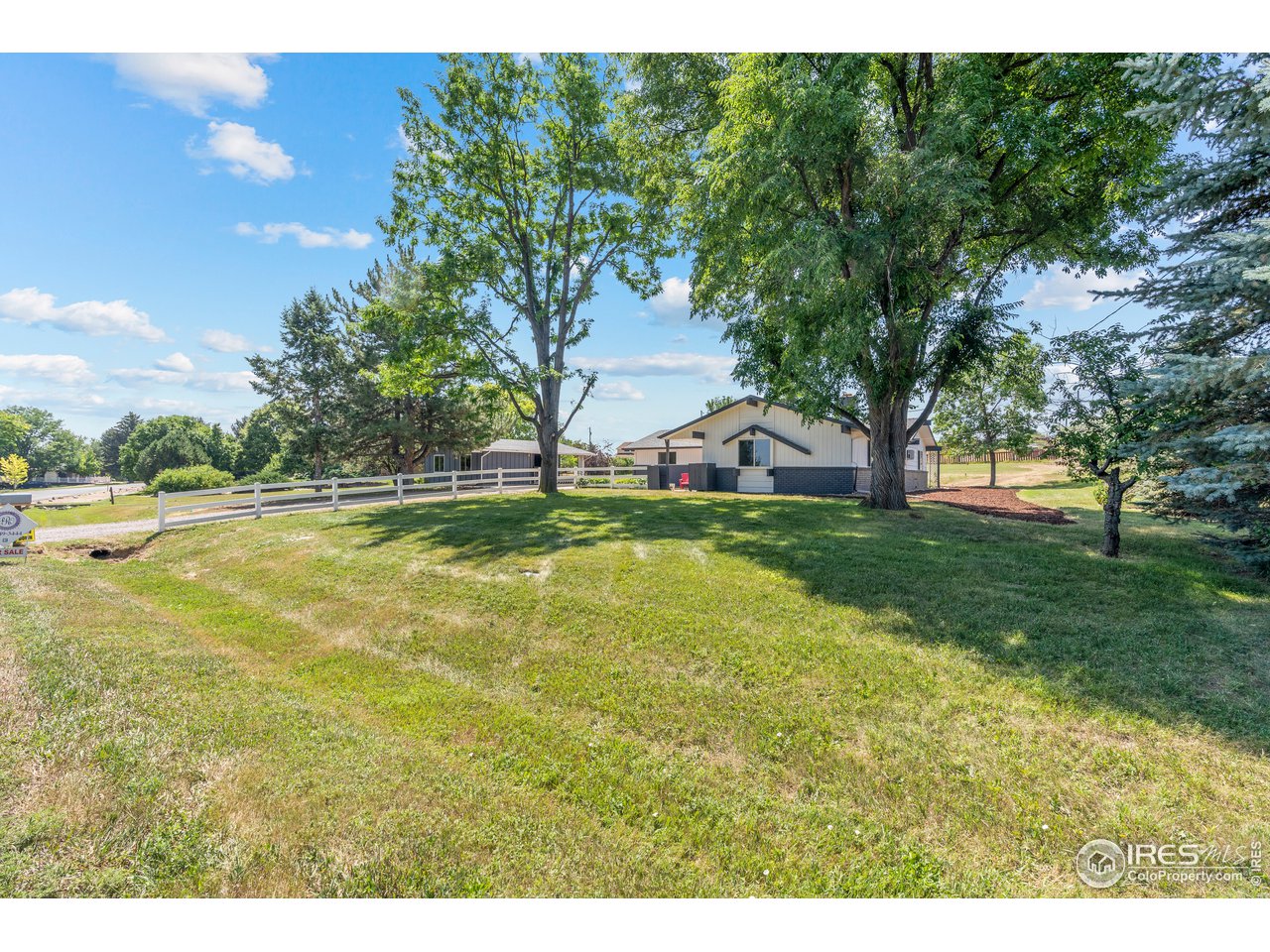 5758 Rustic Knolls Drive Boulder, CO 80301 - Photo 28 of 28 a view of a swimming pool with a yard