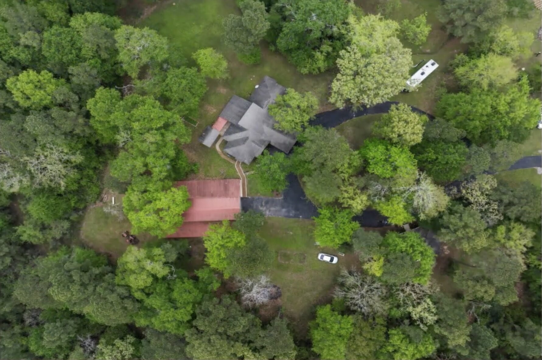 30338 Riley Road Waller, TX 77484 - Photo 4 of 46 an aerial view of residential house with outdoor space and trees all around