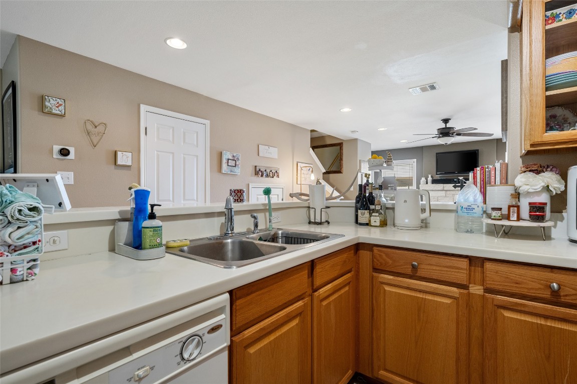 6900 East Riverside Drive, Unit 12 Austin, TX 78741 - Photo 12 of 27 a kitchen with a sink and cabinets