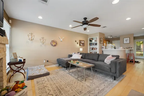 a living room with furniture and window