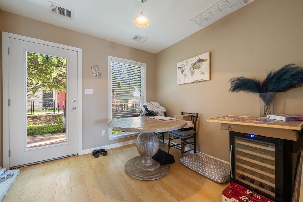 6900 East Riverside Drive, Unit 12 Austin, TX 78741 - Photo 8 of 27 a workspace with furniture window and wooden floor