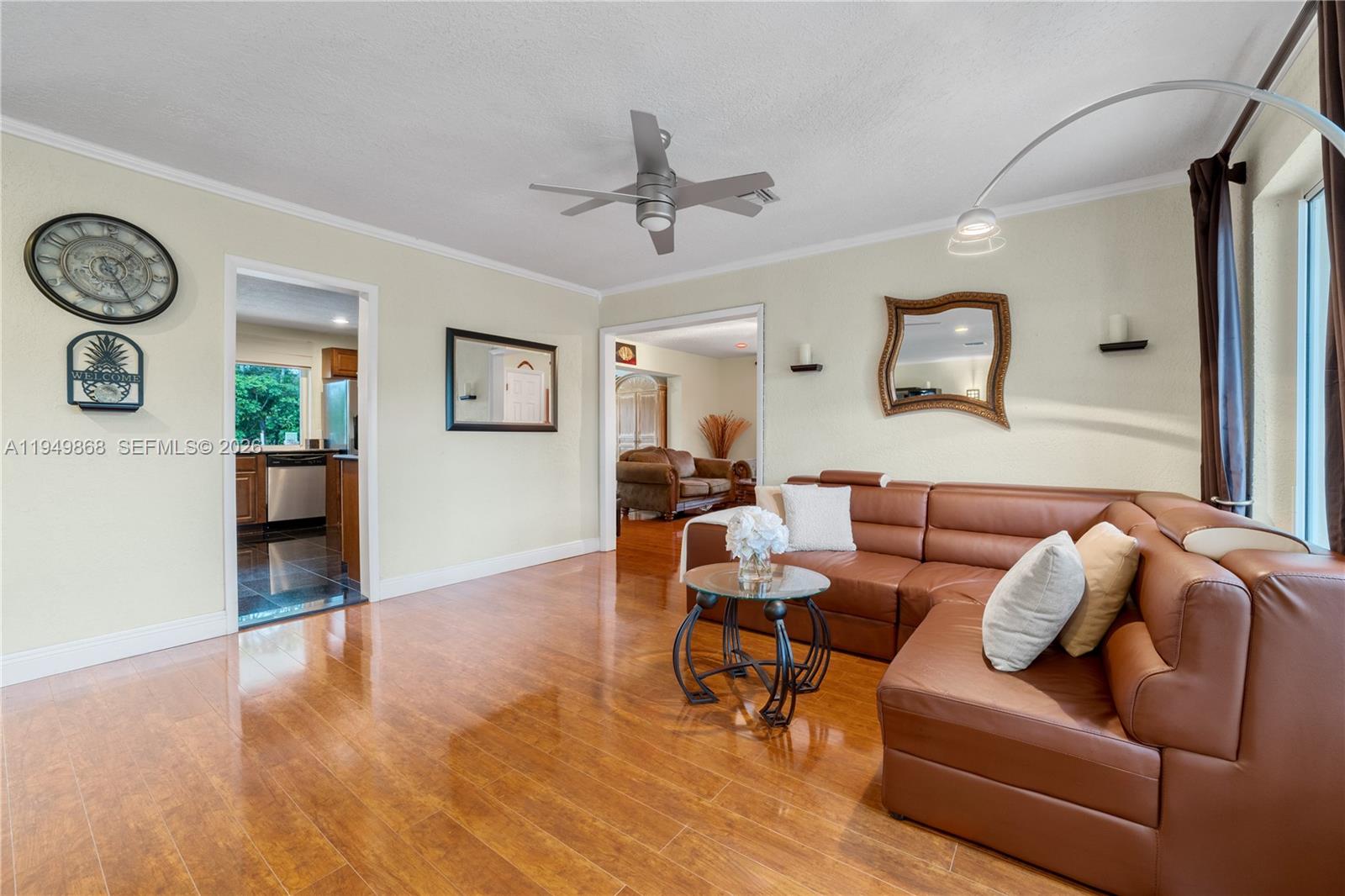 1155 South Biscayne Point Road Miami Beach, FL 33141 - Photo 5 of 23 a living room with furniture and a wooden floor