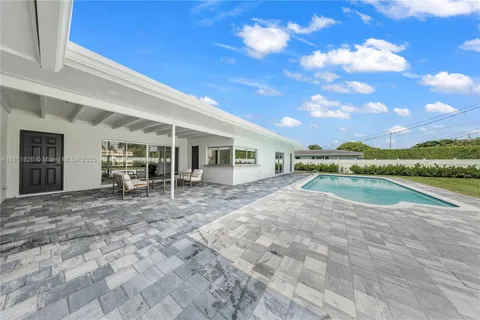 a view of a house with entertaining space