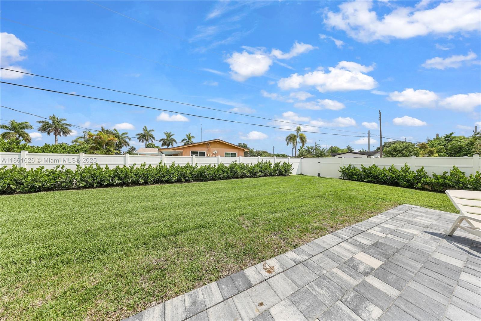 8355 Southwest 89th Street Miami, FL 33156 - Photo 27 of 29 a view of grassy field with mountain