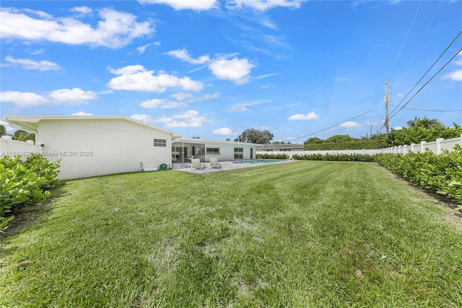 8355 Southwest 89th Street Miami, FL 33156 - Photo 28 of 29 a view of a house with a big yard